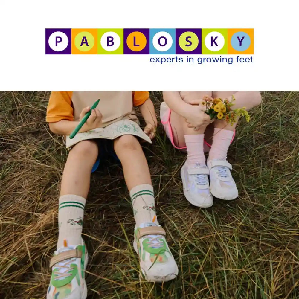 kid with pablosky shoes and logo at the top
