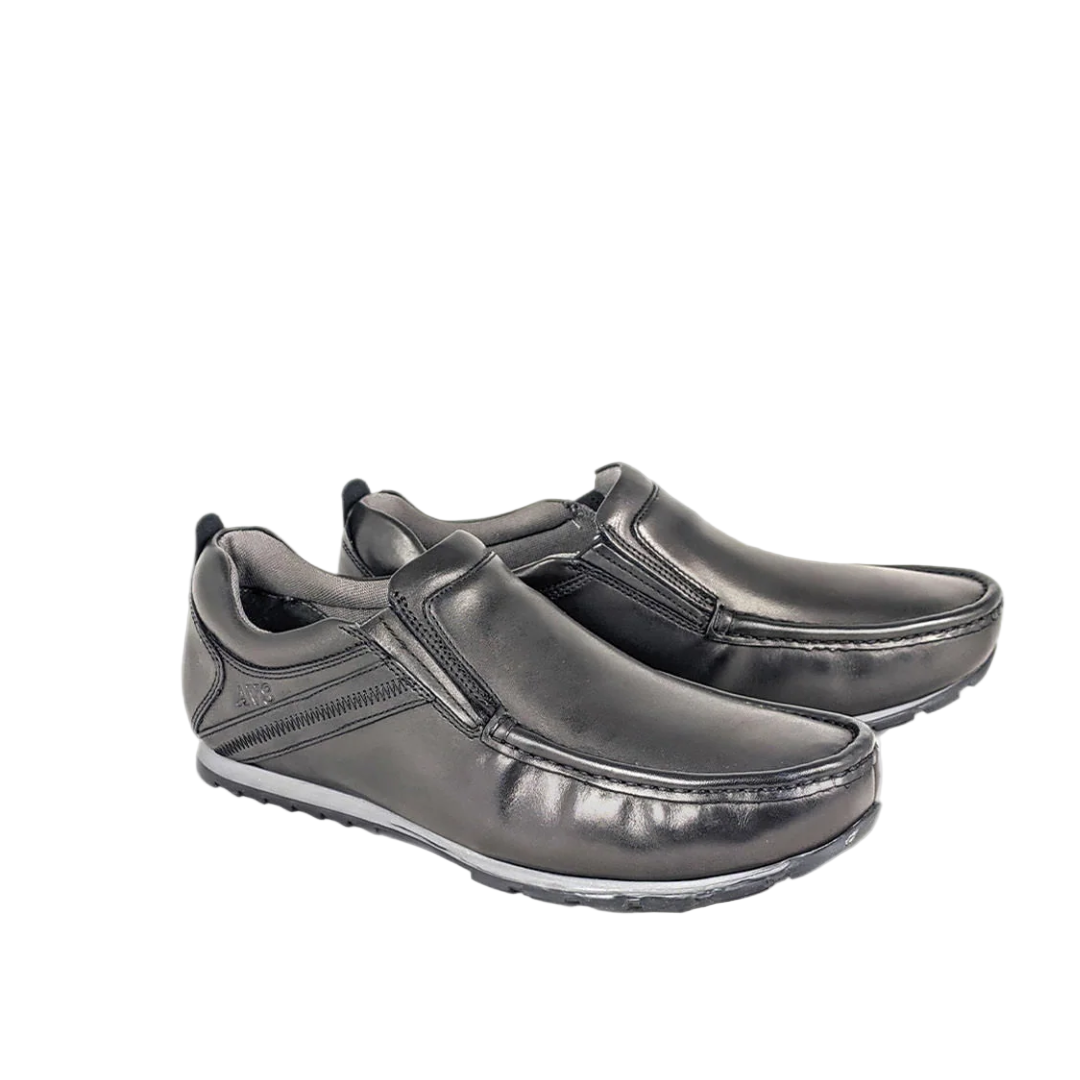 PAIR OF BLACK LEATHER SLIP ON SHOES ON WHITE BACKGROUND