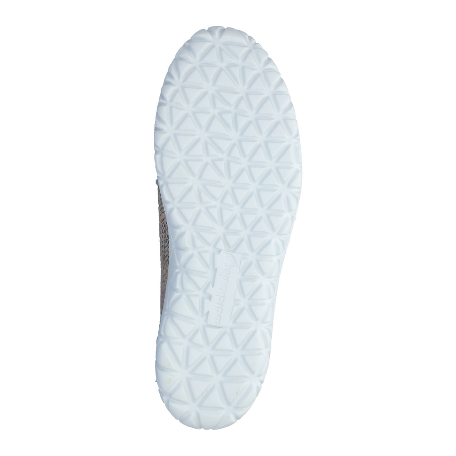 Close-up of a white shoe sole on a white background