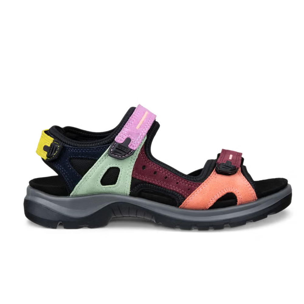 Multicolored sandal with pink, purple, green, and orange straps on a white background