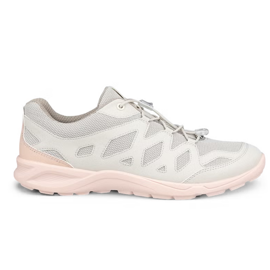 Light gray and pink athletic shoe on a white background