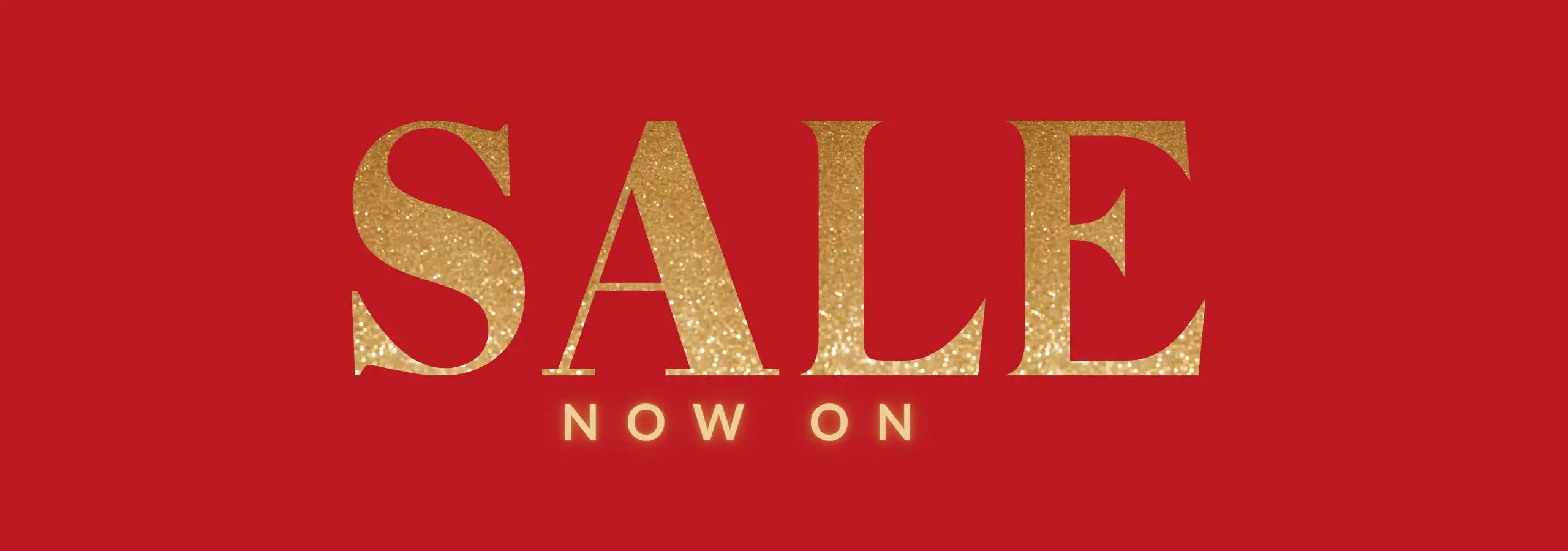 Gold 'SALE NOW ON' text on a red background